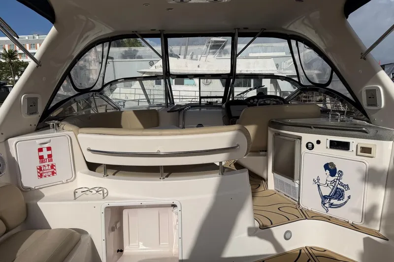 Slide: The Image of Interior of a 2005 Regal Commodore 3860 yacht with seating and nautical decor. - 4
