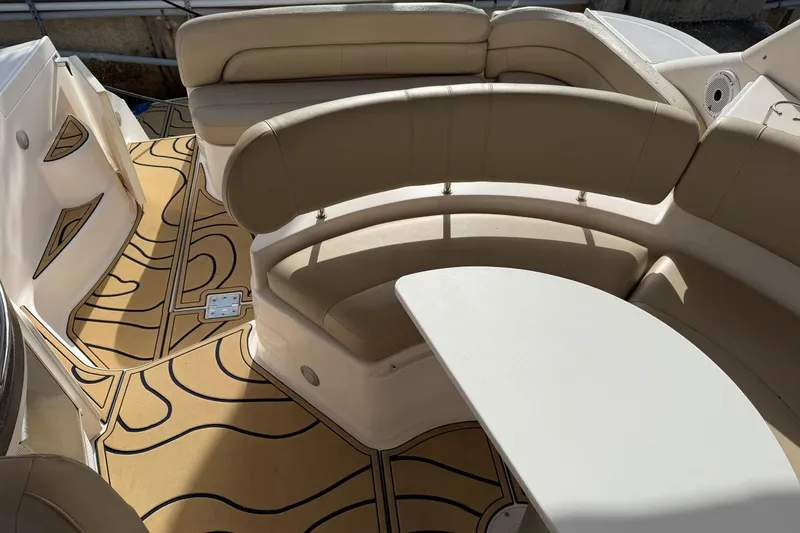 Slide: The Image of Luxurious seating area on a 2005 Regal Commodore 3860 yacht with stylish flooring. - 7