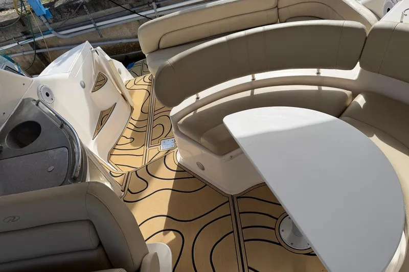 Slide: The Image of Luxurious interior of 2005 Regal Commodore 3860 yacht with elegant seating and table. - 8