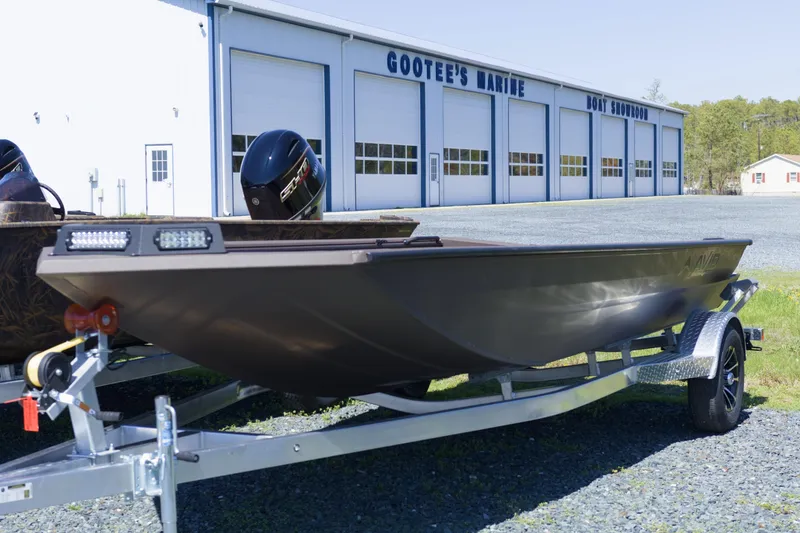 The Image of 2026 Avid 18 Commander boat on trailer outside Gootee's Marine showroom. - 0
