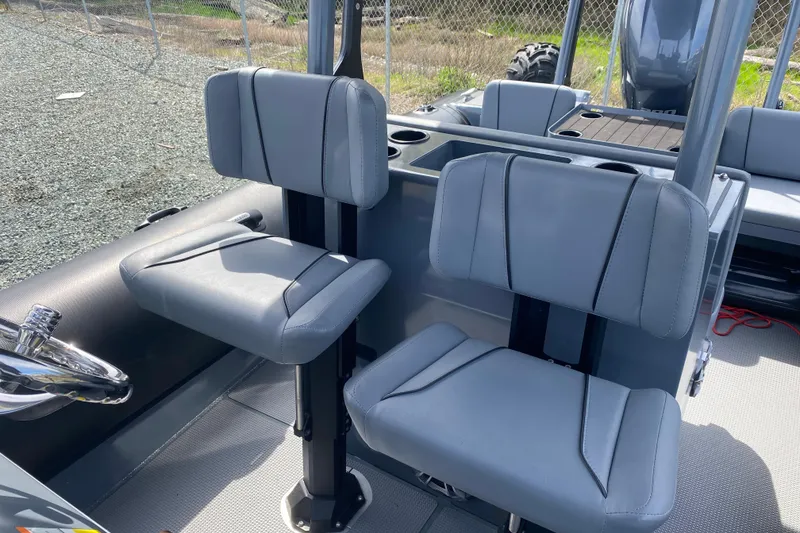 Slide: The Image of 2024 Sealegs 7.5 boat interior with modern seating and steering wheel. - 10
