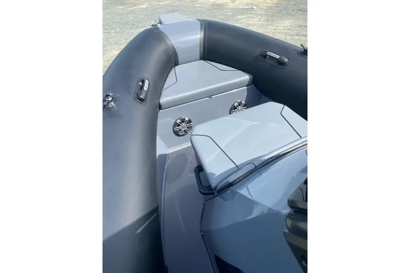 Slide: The Image of 2024 Sealegs 7.5 boat interior with seating and storage compartments. - 14