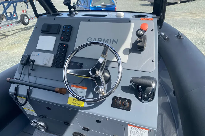 Slide: The Image of Control panel of a 2024 Sealegs 7.5 boat featuring Garmin navigation system. - 9