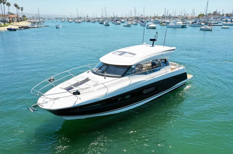 Slide: The Image of 2020 Prestige 460 S yacht cruising on calm waters. - 2