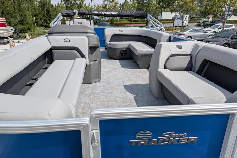 Slide: The Image of 2026 Sun Tracker Party Barge 18 DLX with spacious seating and modern design. - 4