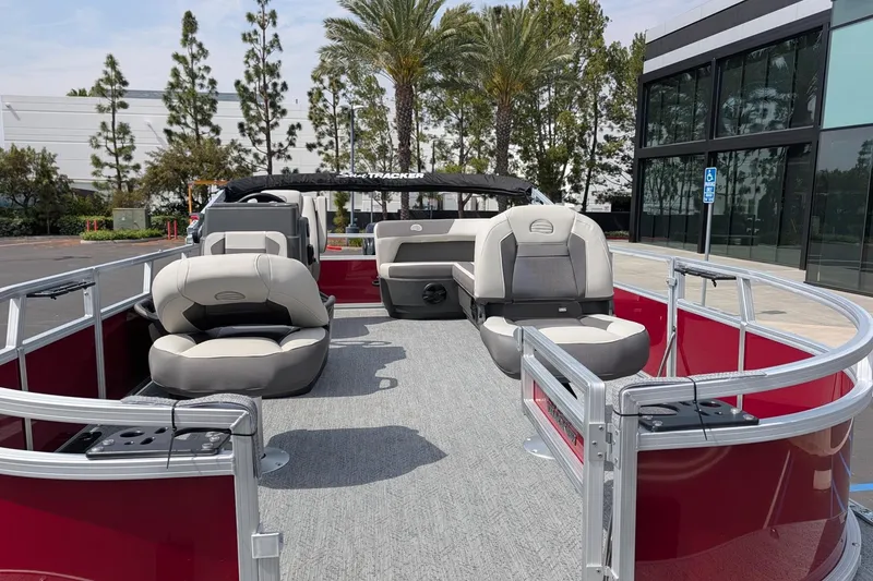 Slide: The Image of 2026 Sun Tracker Bass Buggy 16 XL Select pontoon boat with spacious seating and modern design. - 8