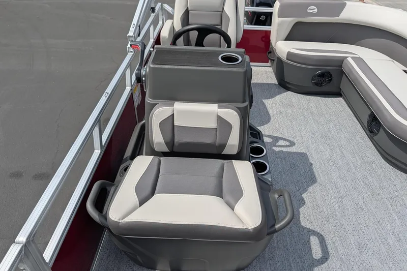 Slide: The Image of 2026 Sun Tracker Bass Buggy 16 XL Select boat interior with comfortable seating and cup holders. - 9