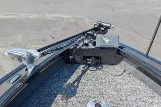 Slide: The Image of 2026 Tracker Targa V-18 WT boat bow with trolling motor and control panel. - 9