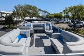 Slide: The Image of 2026 Sun Tracker Party Barge 22 RF XP3 pontoon boat with spacious seating and modern design. - 5
