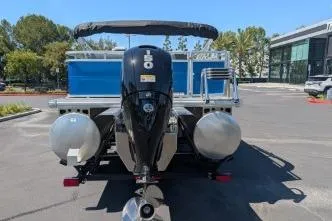 Slide: The Image of 2026 Sun Tracker Party Barge 22 RF XP3 pontoon boat with powerful outboard motor. - 6