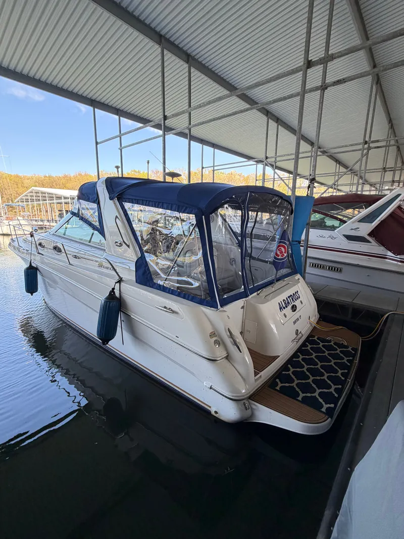 The Image of 2001 Sea Ray 290 Sundancer in covered marina. - 0