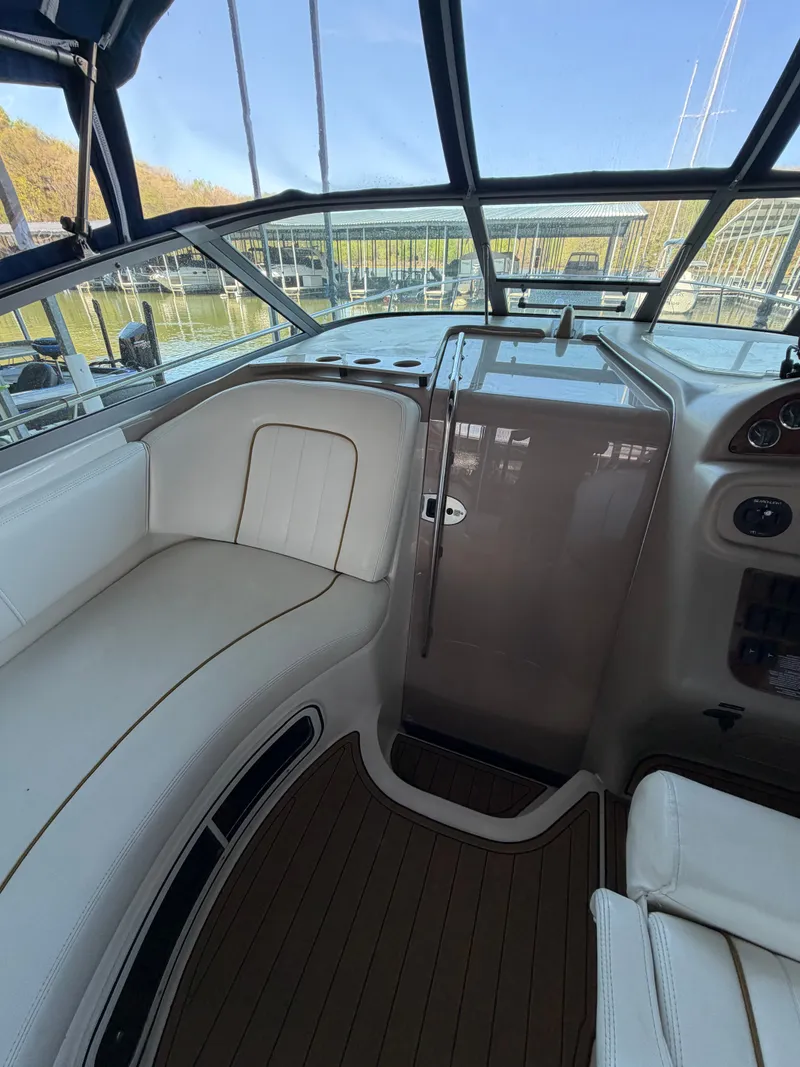 Slide: The Image of Interior of a 2001 Sea Ray 290 Sundancer yacht. - 12