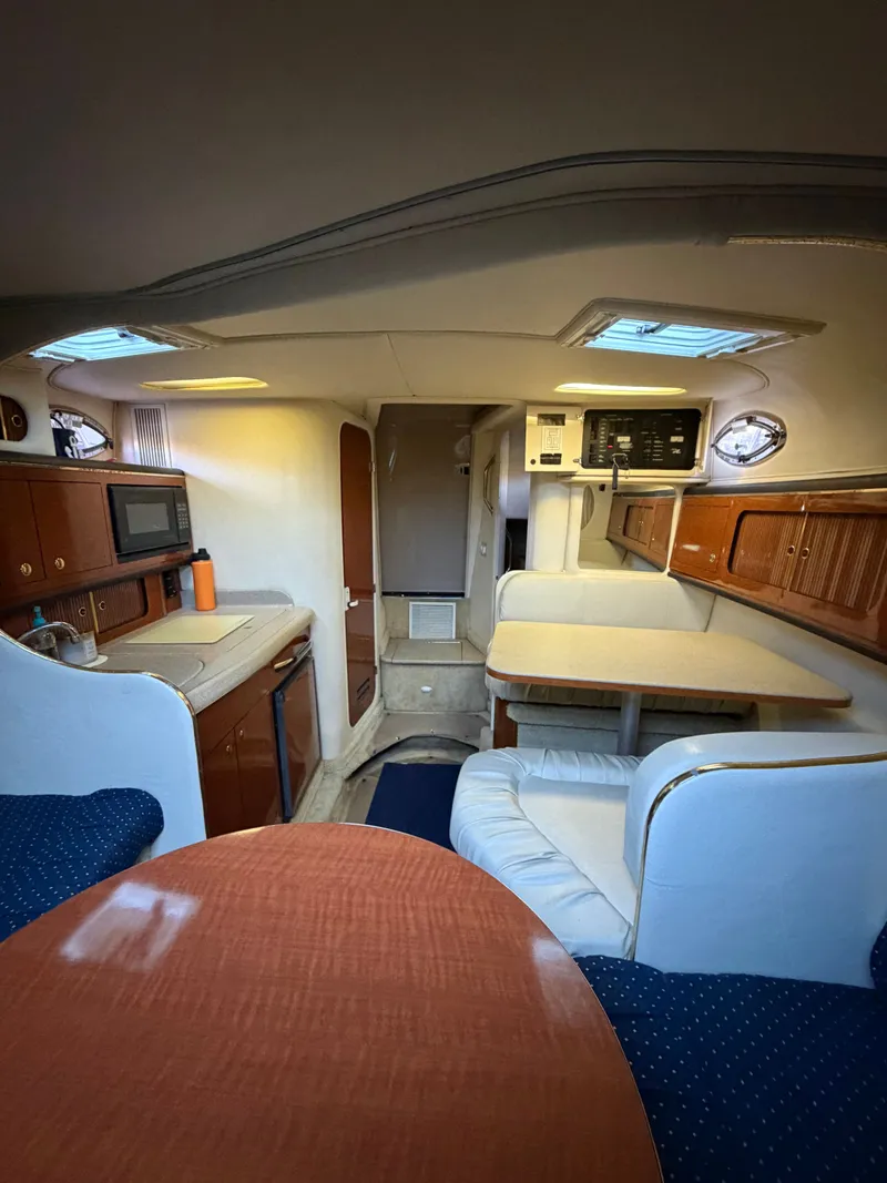 Slide: The Image of Interior of a 2001 Sea Ray 290 Sundancer yacht. - 20