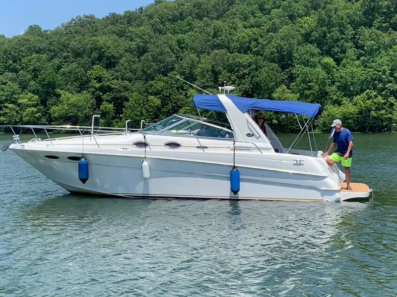 Slide: The Image of 2001 Sea Ray 290 Sundancer on a tranquil lake. - 5