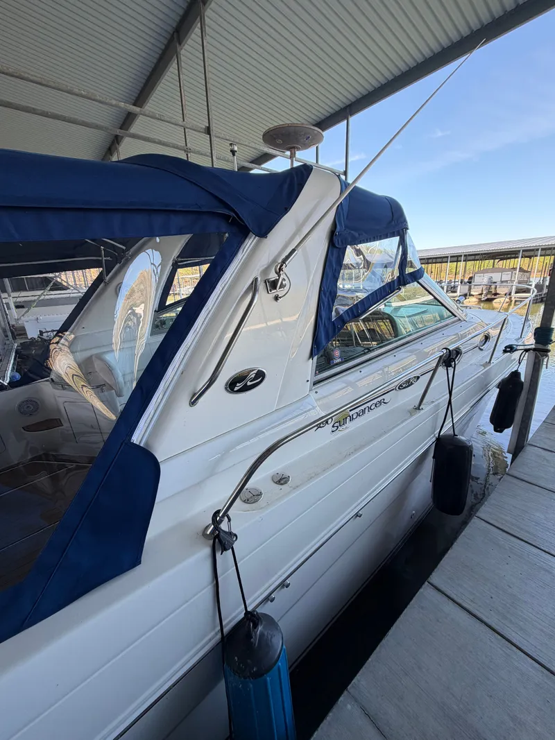 Slide: The Image of 2001 Sea Ray 290 Sundancer boat docked in marina. - 6