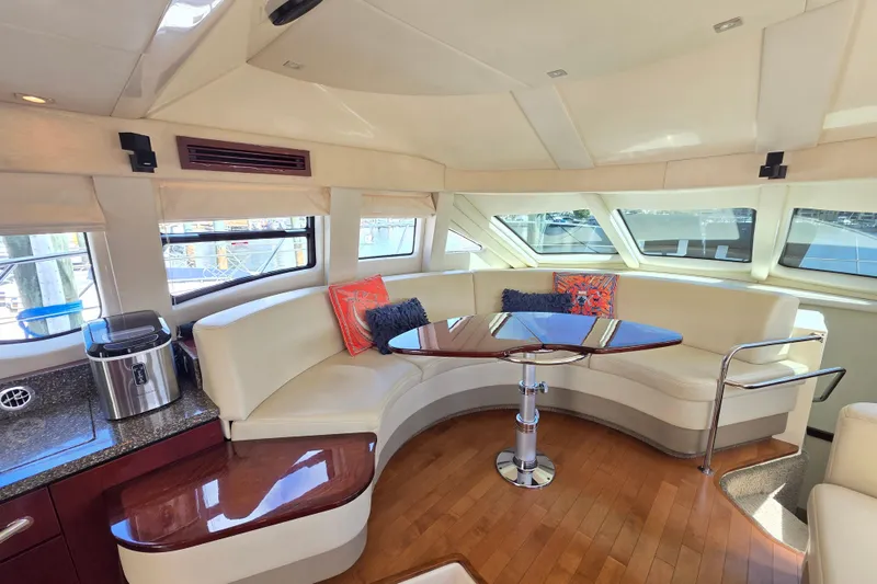 Slide: The Image of Luxurious interior of 2008 Sea Ray 47 Sedan Bridge yacht with elegant seating and modern decor. - 26