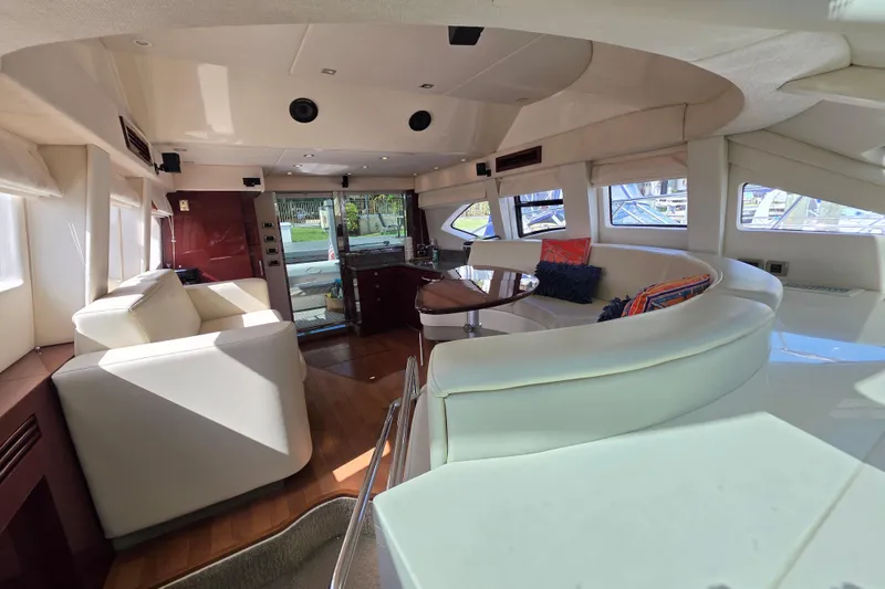 Slide: The Image of Luxurious interior of 2008 Sea Ray 47 Sedan Bridge yacht with elegant seating and modern design. - 28