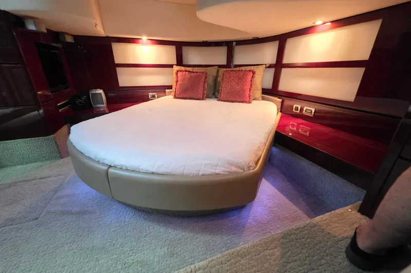 Slide: The Image of Luxurious bedroom interior of 2008 Sea Ray 47 Sedan Bridge yacht with ambient lighting. - 30
