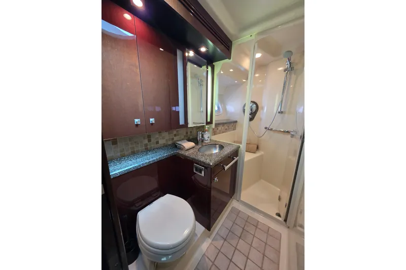 Slide: The Image of Luxurious bathroom in 2008 Sea Ray 47 Sedan Bridge yacht with modern fixtures and shower. - 32