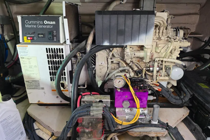 Slide: The Image of Cummins Onan marine generator in 2008 Sea Ray 47 Sedan Bridge engine room. - 37
