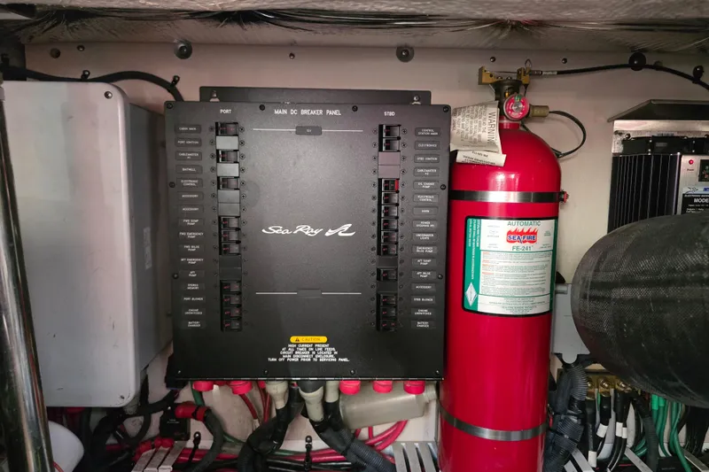 Slide: The Image of Electrical panel and fire extinguisher in 2008 Sea Ray 47 Sedan Bridge yacht. - 41