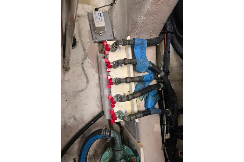 Slide: The Image of Engine room plumbing of a 2008 Sea Ray 47 Sedan Bridge yacht. - 42