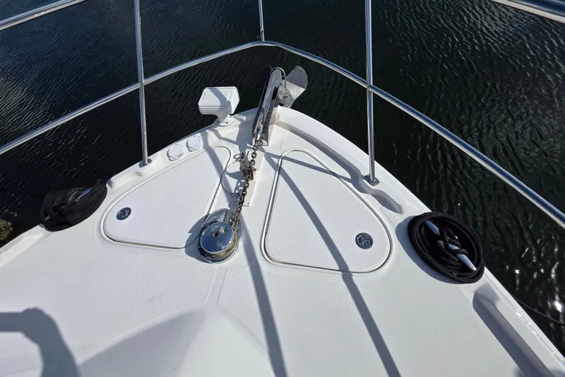 Slide: The Image of Bow of 2008 Sea Ray 47 Sedan Bridge yacht with anchor and railing. - 5