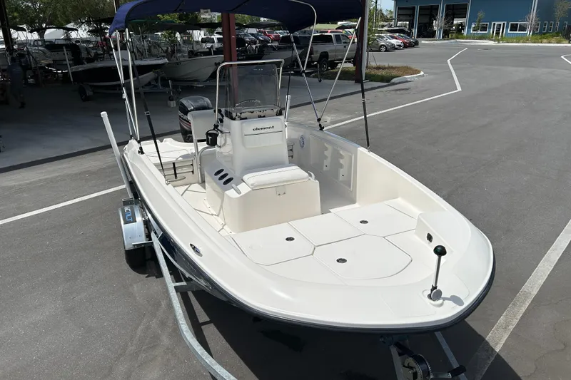 Slide: The Image of 2018 Bayliner Element F16 boat on trailer in parking lot. - 6