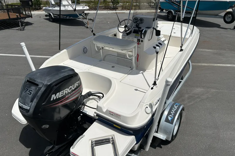 Slide: The Image of 2018 Bayliner Element F16 boat with Mercury 75 engine on trailer. - 7