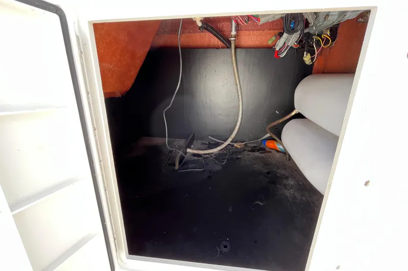 Slide: The Image of Interior storage compartment of a 2015 Hurricane SunDeck Sport 201 OB boat. - 28