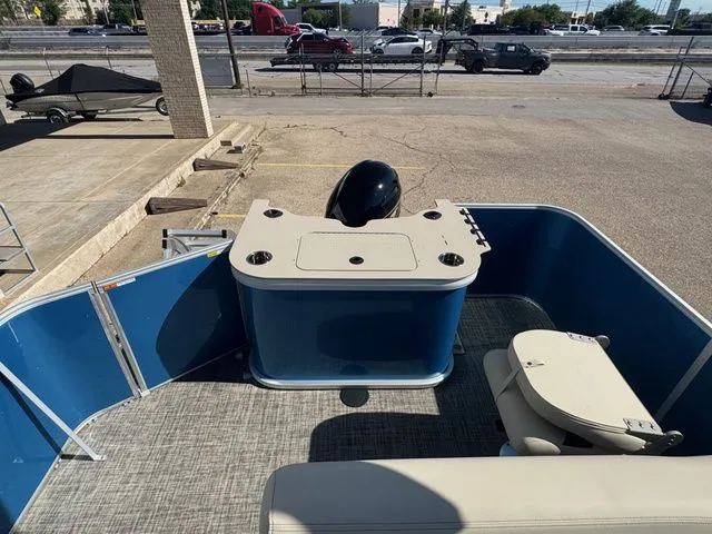Slide: The Image of 2026 SunCatcher Select 20F pontoon boat, blue deck, beige seats. - 6