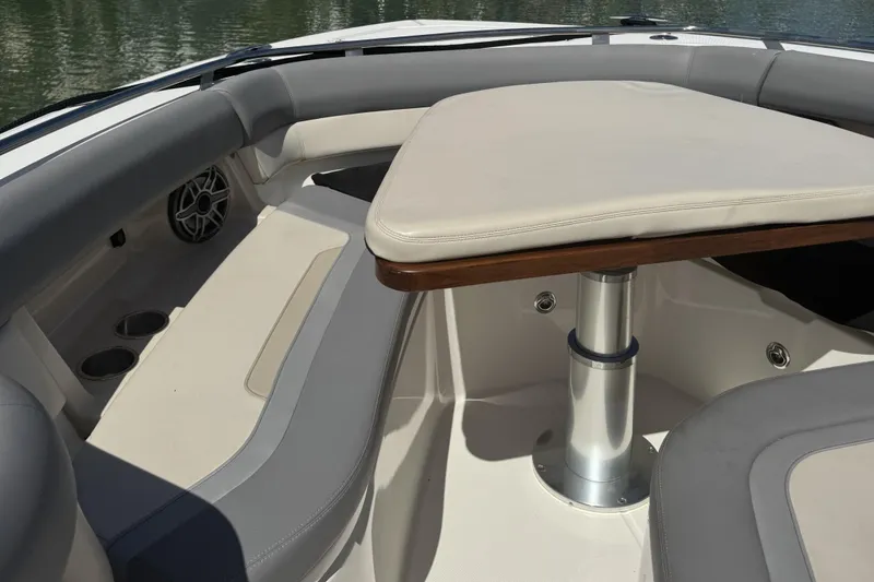 Slide: The Image of Luxurious seating area on the 2024 Boston Whaler 380 Realm boat, featuring elegant upholstery. - 13