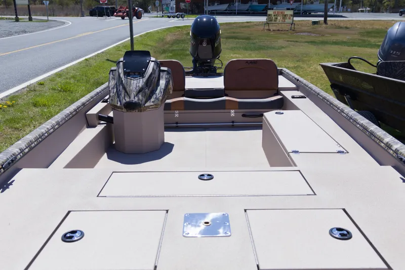 Slide: The Image of 2026 Avid 20 Rogue SC boat interior with seating and storage compartments. - 10