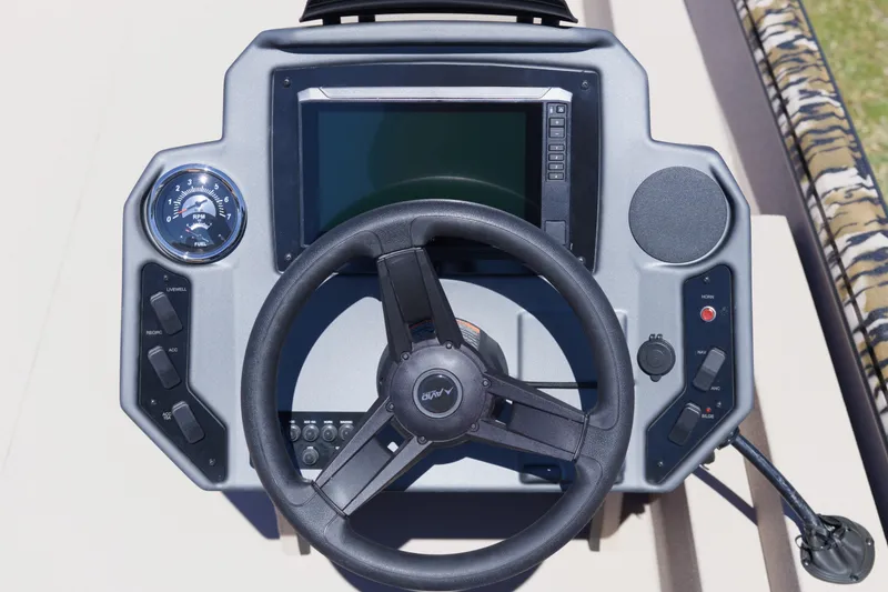Slide: The Image of Steering console of 2026 Avid 20 Rogue SC boat with digital display and controls. - 13