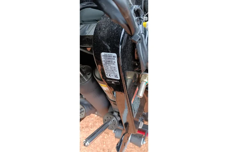 Slide: The Image of Close-up of a 2026 Tracker Targa V-19 WT boat component with label details. - 4