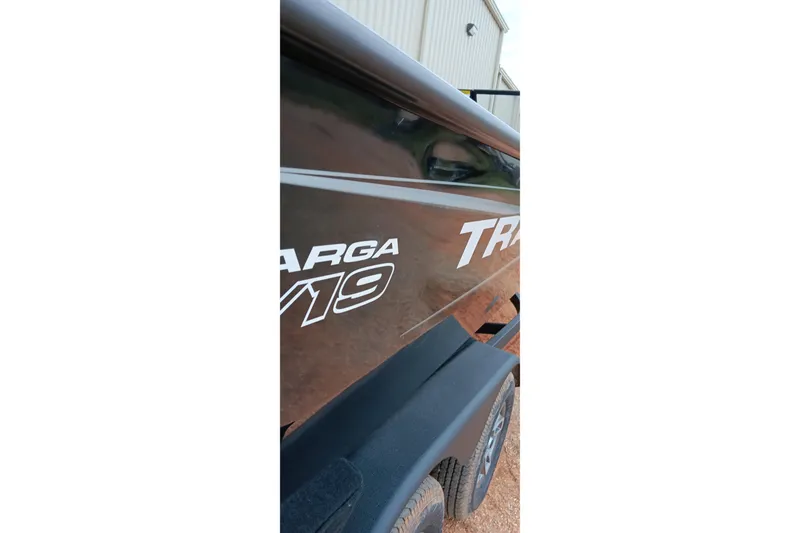 Slide: The Image of 2026 Tracker Targa V-19 WT boat side view with trailer. - 5