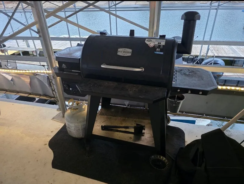 Slide: The Image of Black grill on patio with lake view, STARDUST 53, 1992. - 24