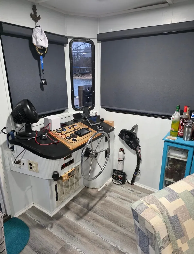 Slide: The Image of Interior of a 1992 STARDUST 53 boat with control console. - 29