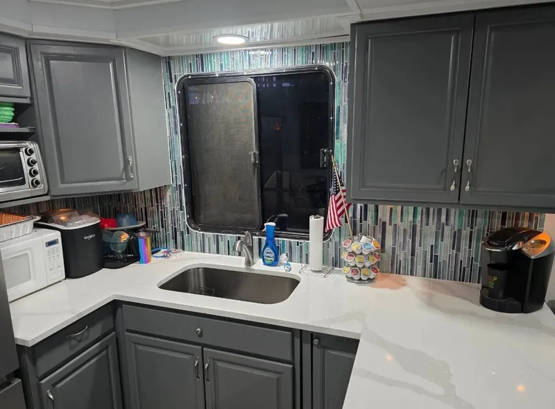 Slide: The Image of Modern kitchen with gray cabinets and mosaic tiles, STARDUST 53, 1992. - 36