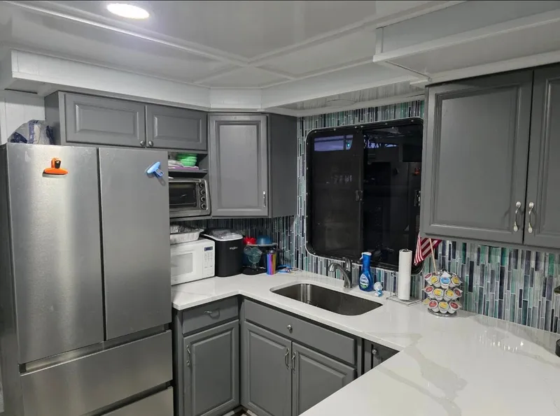 Slide: The Image of Modern kitchen with gray cabinets and mosaic tiles, STARDUST 53, 1992. - 37