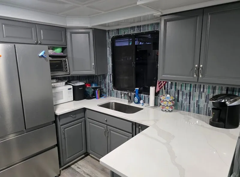 Slide: The Image of Modern kitchen with gray cabinets and mosaic tiles, STARDUST 53, 1992. - 38