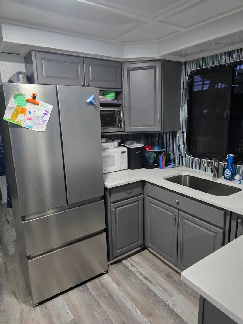 Slide: The Image of Modern kitchen with gray cabinets and stainless steel appliances, STARDUST 53, 1992. - 42