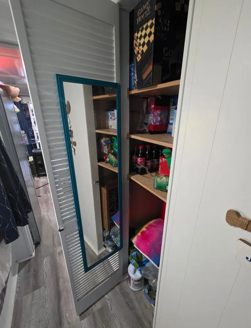 Slide: The Image of Pantry with mirror in a 1992 STARDUST 53 RV. - 45