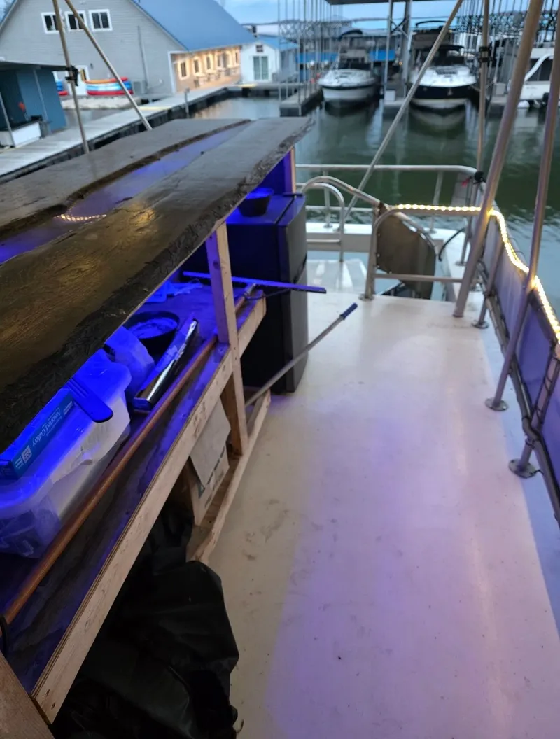 Slide: The Image of Interior view of a 1992 STARDUST 53 boat at the marina. - 7