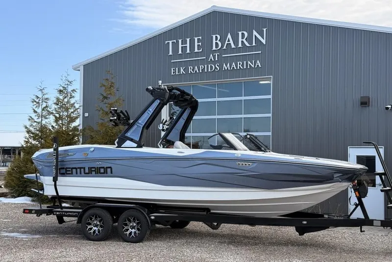 The Image of 2026 Centurion Nv233 boat on trailer at Elk Rapids Marina. - 1
