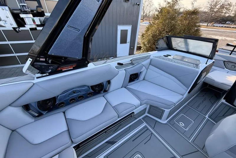 Slide: The Image of Luxurious interior of 2026 Centurion Nv233 boat with sleek seating and modern design. - 12