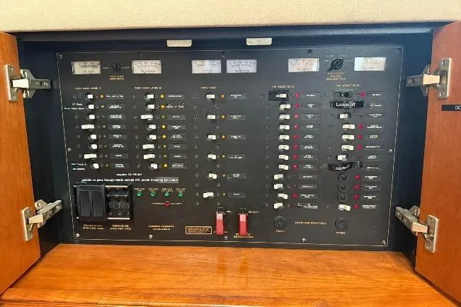Slide: The Image of Electrical panel of 2001 Cruisers Yachts 4450 Express Motoryacht with switches and indicators. - 31