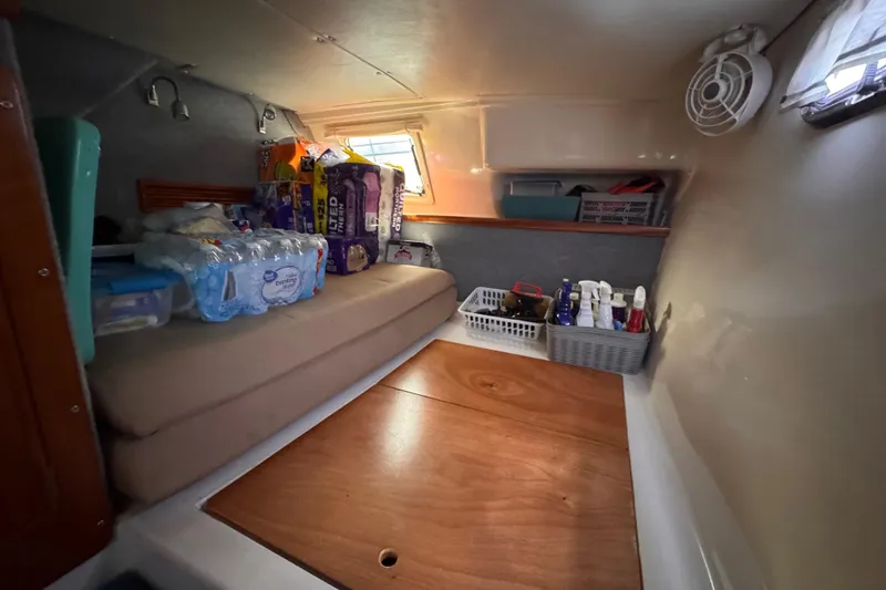 Slide: The Image of Interior cabin of 2006 PDQ PowerCat with storage and supplies. - 9