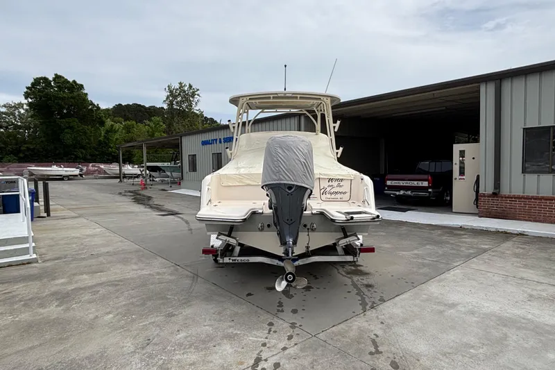 Slide: The Image of 2022 Grady-White Freedom 235 boat on trailer at service facility. - 3