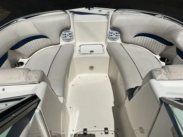 Slide: The Image of Interior of a 2008 Hurricane SunDeck 2000 boat with white seating. - 11